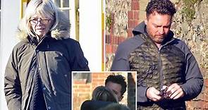 Zoe Ball embraces boyfriend Michael Reed outside new country cottage after leaving Brighton to 'move forward' with relationship