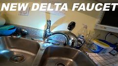 Old crusty faucet replaced with new Delta one handle