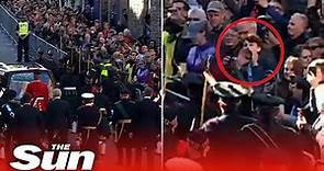 Prince Andrew heckled during Queen’s funeral procession as heckler is forcefully removed