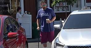 Adam Sandler uses a cane to get breakfast with his wife Jackie