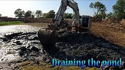 Digging Out And Draining The Pond