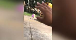 Car nearly hits hit child getting off school bus