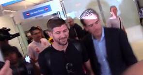 Steven Gerrard lands in Los Angeles with his wife, Alex Curran