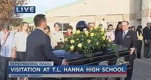 Procession arrives at T.L. Hanna High