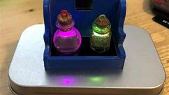 Colorful Battery Powered Mini Potion Pendant With Charging Shelf #WearableWednesday