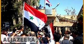 🇸🇾 Syria's Deraa: Regime raises flag in cradle of protest movement | Al Jazeera English
