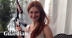 Maria Butina, accused Russian spy, poses with politicians and questions Trump