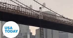 Brooklyn Bridge hit, damaged by massive crane | USA TODAY