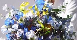 Nakajima Kazuki on Instagram: "Van Gogh's "The Starry Night" design tied together with spring flowers. ⁡ ⁡ @nakajima_kazuki_florist ⁡ ⁡ #flowerdesign #florist #bouquet #art #vangogh #starrynight"