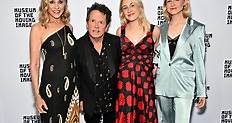 Michael J. Fox’s twin daughters join him on the red carpet as he receives lifetime achievement award