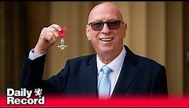Ken Bruce receives MBE for services to radio, autism awareness and charity