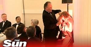 Tory MP grabs Greenpeace activist by her neck | Mark Field MP