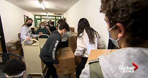 Students at St. Thomas High School hold food and sock drive to help those in need