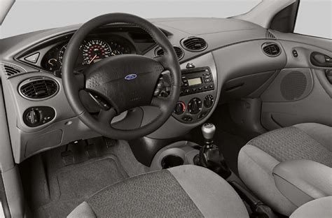 Interior of a 03 Ford Focus, highlighting its practical design and comfortable seating