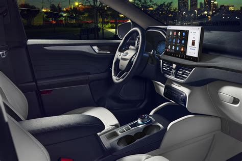 Interior view of a 07 Ford Escape Hybrid showcasing its practical layout and technology.