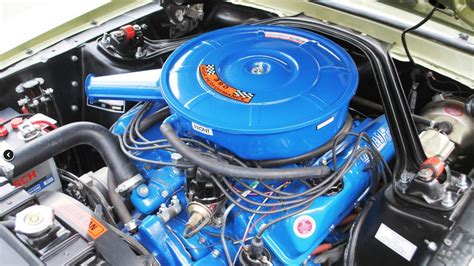 Close-up of a modified V8 engine in a 1967 Ford Mustang