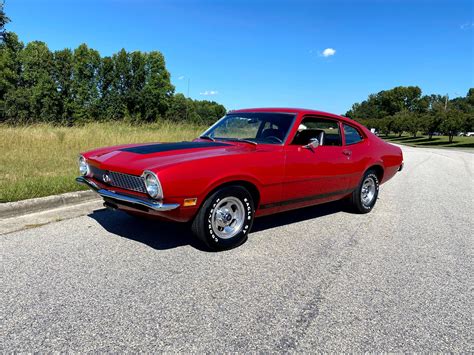 Interior view of a 1971 Ford Maverick, highlighting its functional and classic dashboard.