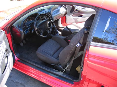 Interior view of a 1997 Ford Mustang GT showcasing its driver-focused dashboard and comfortable seating