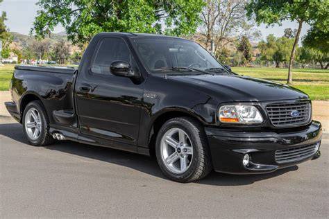 Front view of a 2004 Ford F-150 Lightning with its aggressive stance