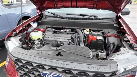 Close-up of a 1974 Ford Maverick engine bay, showcasing its mechanical components