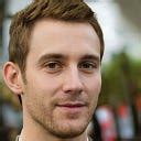 Assigning default values to shell variables with a single command in bash