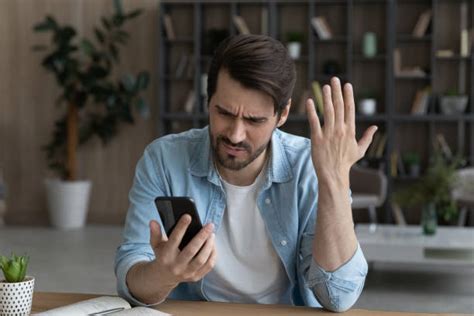 Frustrated Person with Phone