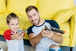 Kids Playing with Toy Guns