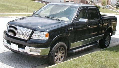 Side profile of the Lincoln Mark LT pickup truck, highlighting its elegant design