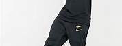 Nike Black and Gold Joggers Men