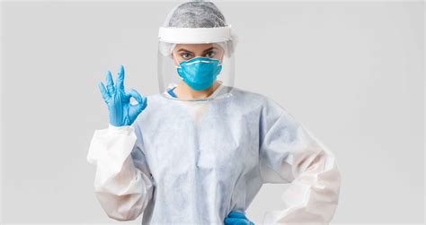 Nurse wearing comprehensive protective clothing at the hospital
