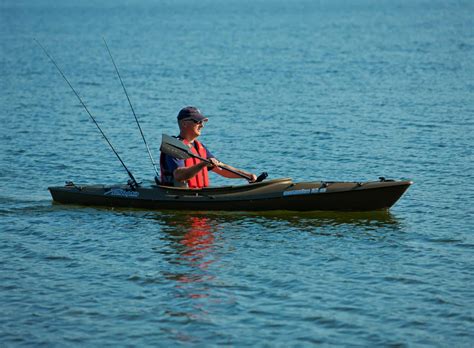 Sit-in fishing canoe