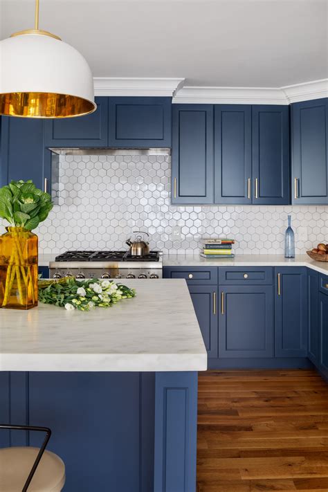 backsplash with blue cabinets