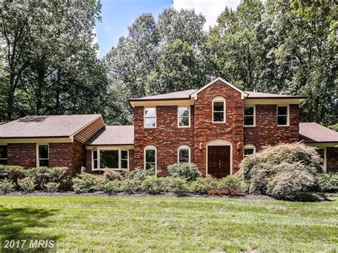 brick house without shutters