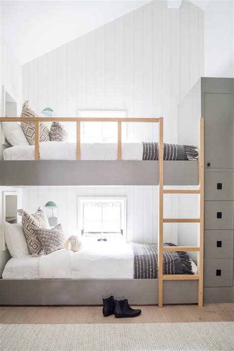 bunk bed in front of window