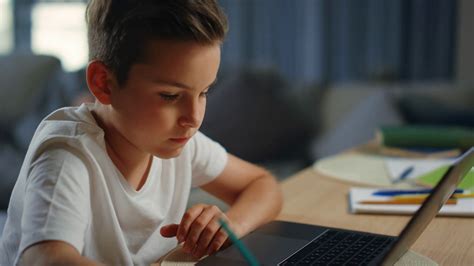 Child Studying with Laptop