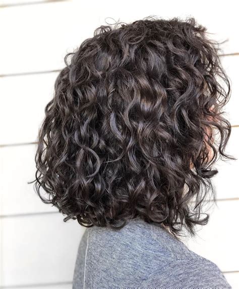 curly layered long bob