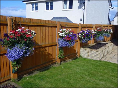 fence plant pots