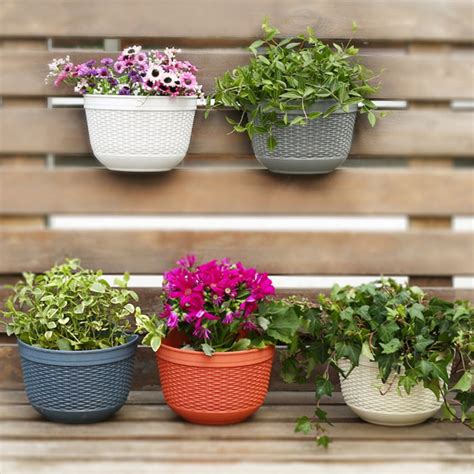 fence plant pots