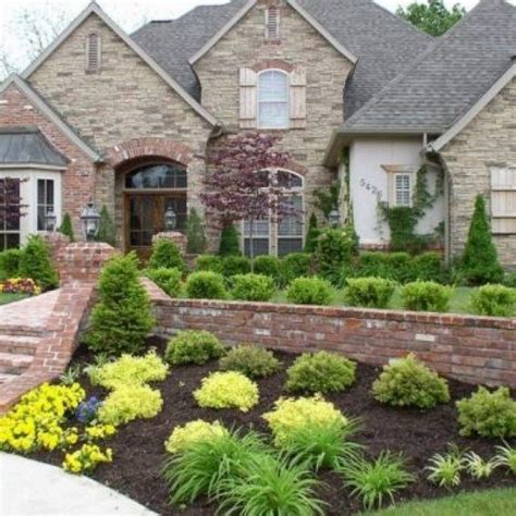 flower beds in front of house