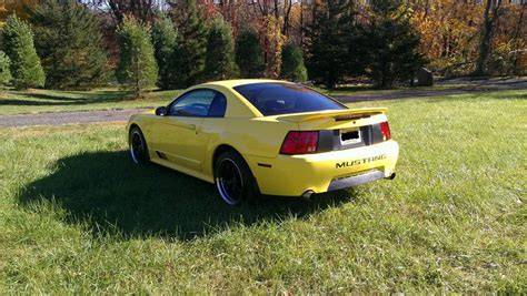 Comparison of different Ford Mustang suspension setups showcasing spring variations