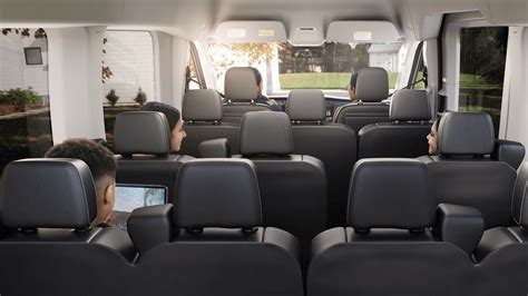 Customized Ford Transit van interior with shelving and storage solutions