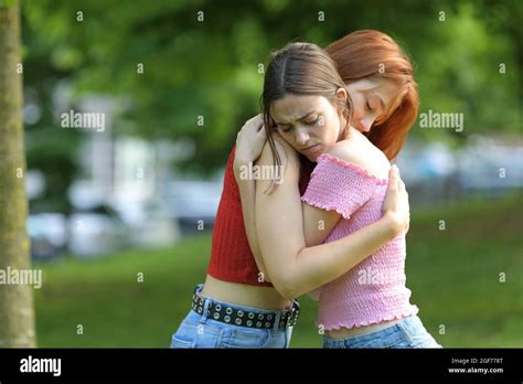 friends hugging goodbye