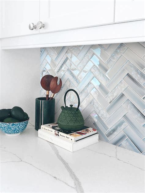glass herringbone backsplash