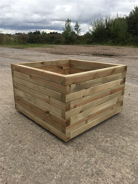 large wooden planters for trees