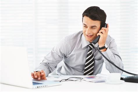 Man in Office on Phone