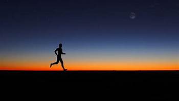 man jogging at dawn