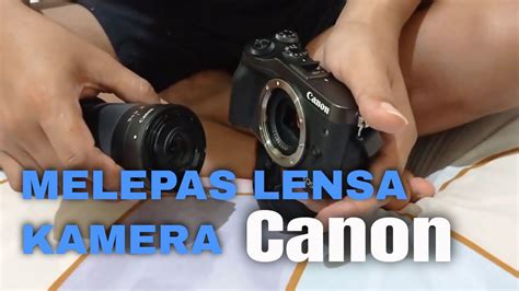 memasang lensa kamera