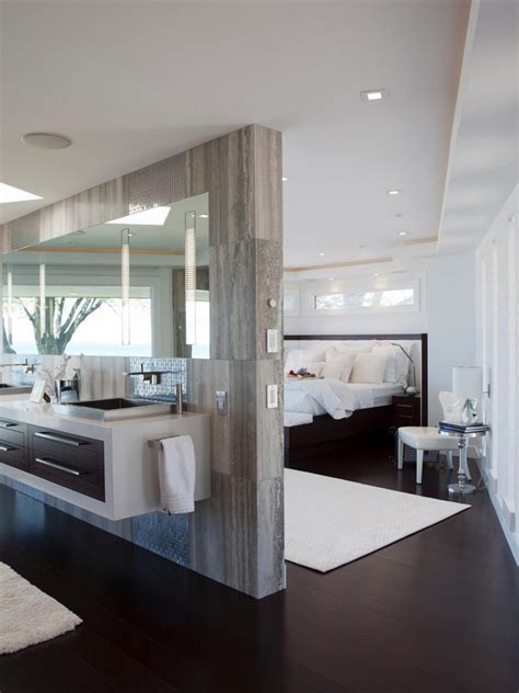 modern master bedroom with open bathroom