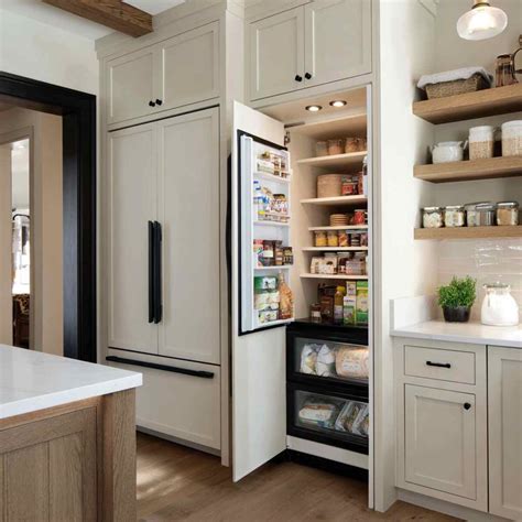 pantry with refrigerator