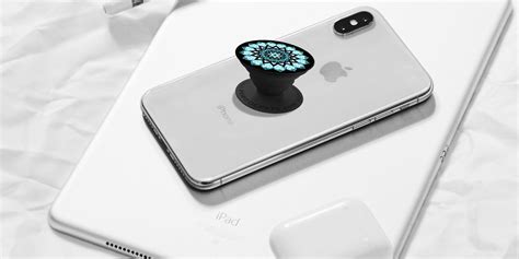 place Pop Socket on the back of a smartphone